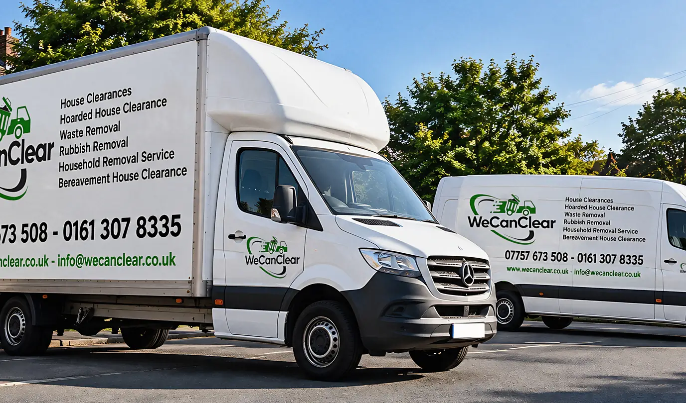 Two liveried We Can Clear vans parked side by side